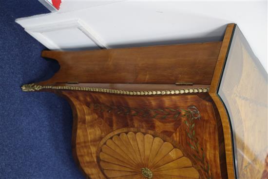 A George III style satinwood and marquetry serpentine commode, in the style of John Cobb, W.4ft 6.5in.